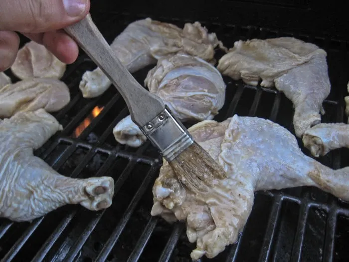Baste Chicken on BBQ
