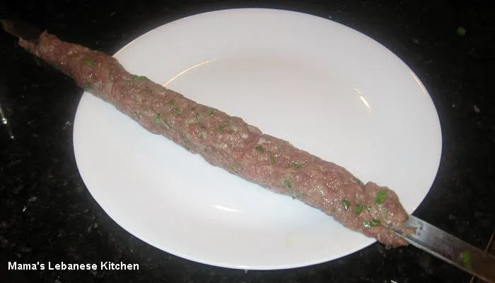 Put Kafta on skewer or make into patties Kafta Mishwiyyeh