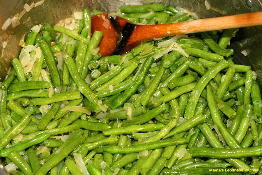 Add Green Beans to Pot and Mix Well Green Beans and Olive Oil Saute Recipe