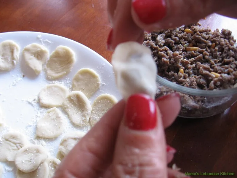 Fold dough edges on fillings Shish Barak Lebanese