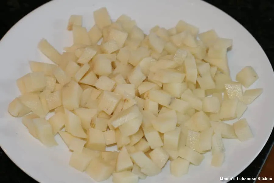Slice Potatoes Into Small Cubes batata ma3 kizbra recipe