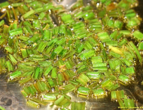 Lightly fry the garlic leaves with a bit of olive oil